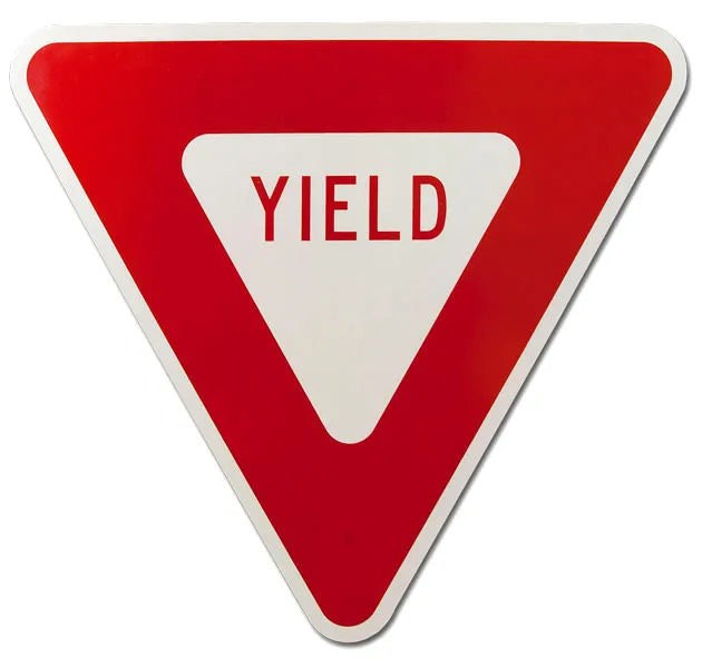 Reflective inverted-triangle yield sign in red and white