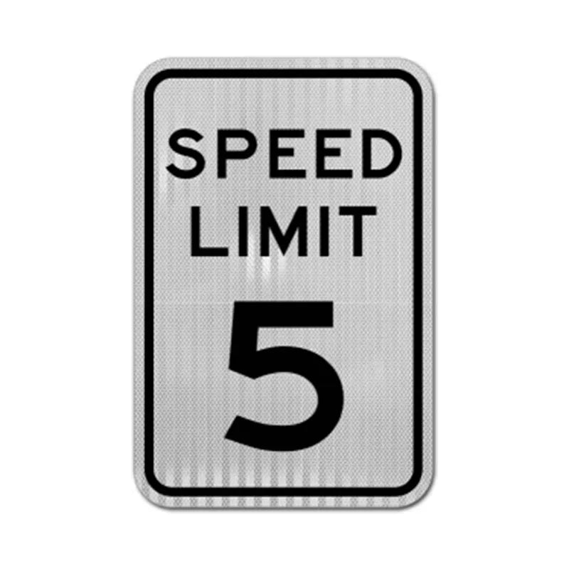 Reflective rectangular speed limit sign with black numerals on white background