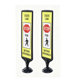 Two spring-back pedestrian crosswalk sign stands with reflective panels